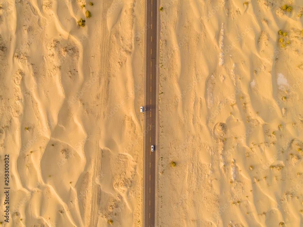 aerial view of highway on the gobi desert xinjiang， 