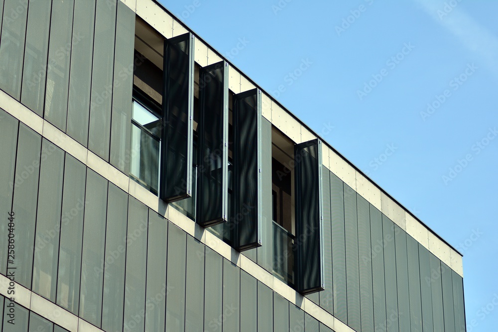 Fragment of a modern apartment building in front. Very modern apartment house.