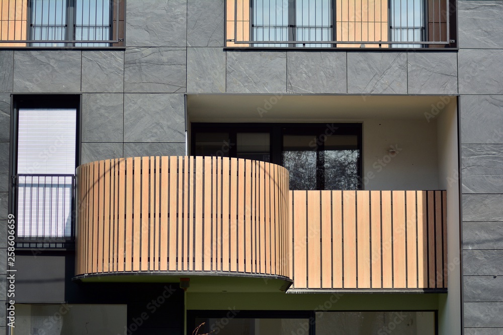 Fragment of a modern apartment building in front. Very modern apartment house.