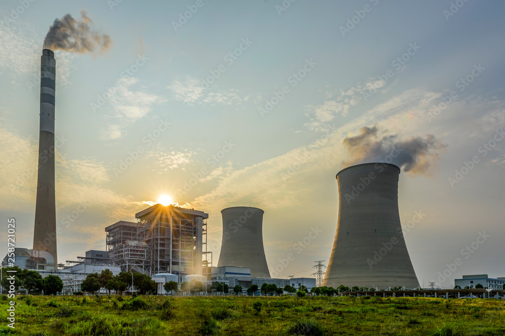 At dusk, the thermal power plants , tops of cooling towers of atomic power plant