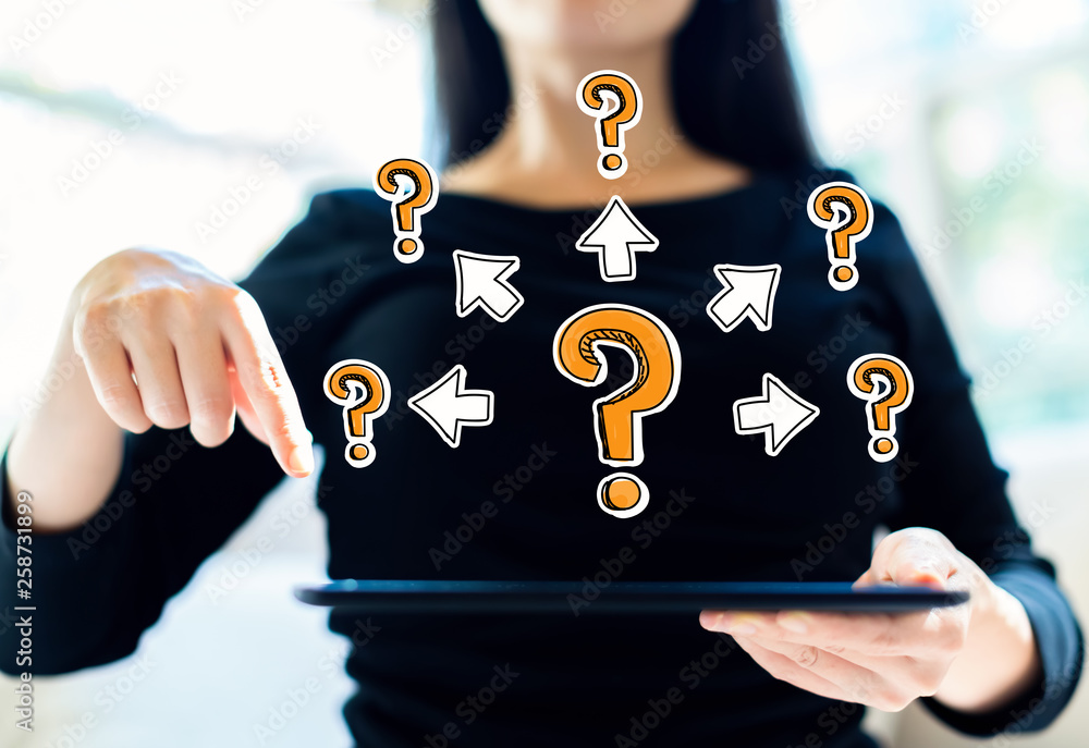 Big and small question marks with arrows with woman using her tablet