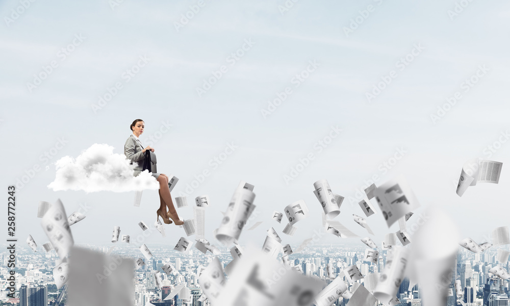 Woman float above city on cloud and papers flying around