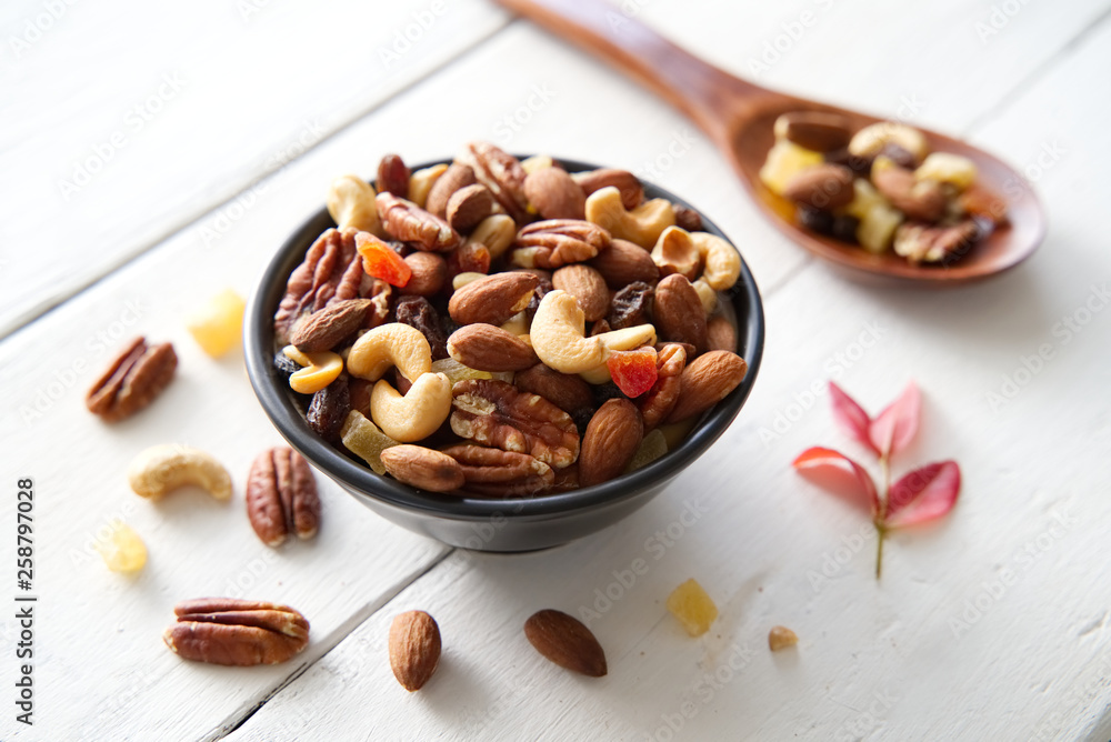 Mix nuts and dried fruits background and wallpaper. Seen in top view of mix nuts and dried fruits in