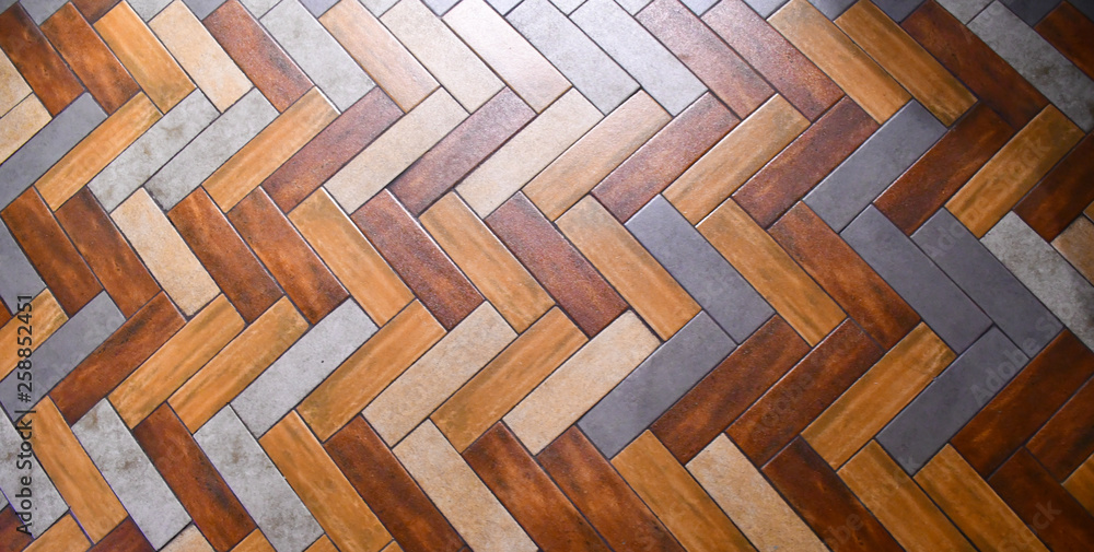 wood pattern tiles in the Herringbone Pattern.