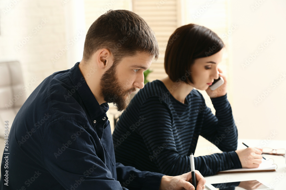 Designers working on project in office