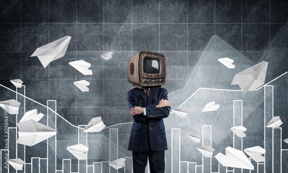 Businessman with old TV instead of head.