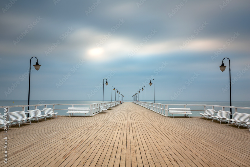 Wooden pier in Gdynia Orlowo at dawn, Poland