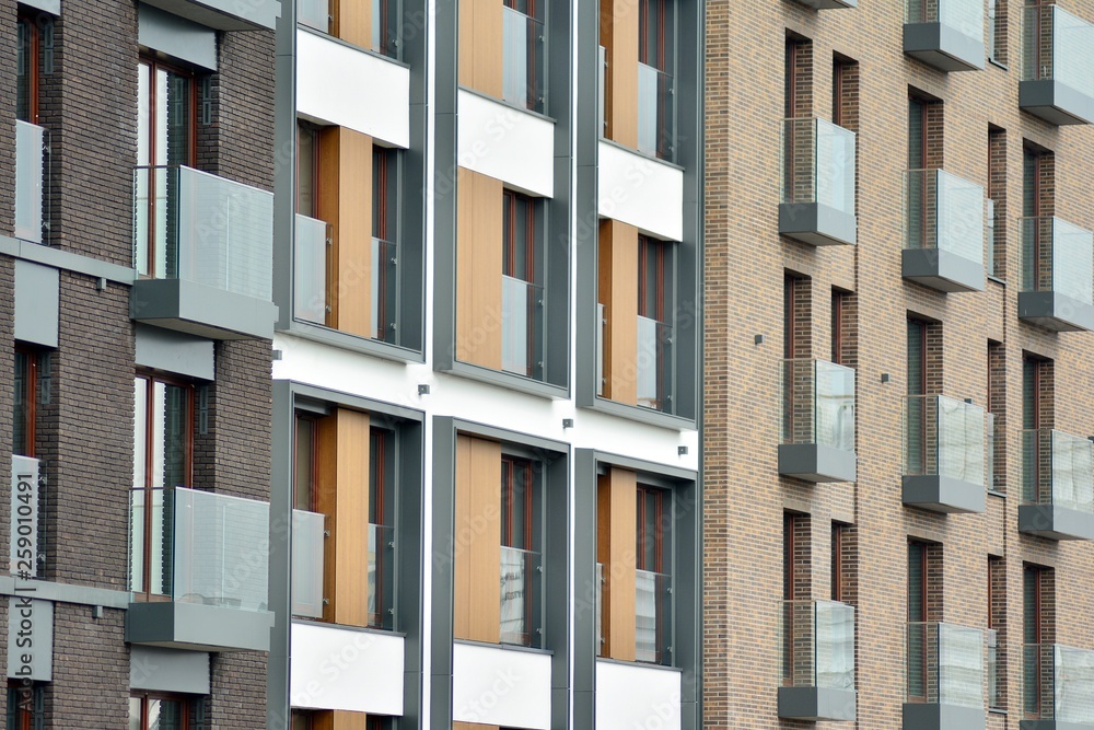 Fragment of a modern apartment building in front. Very modern apartment house.