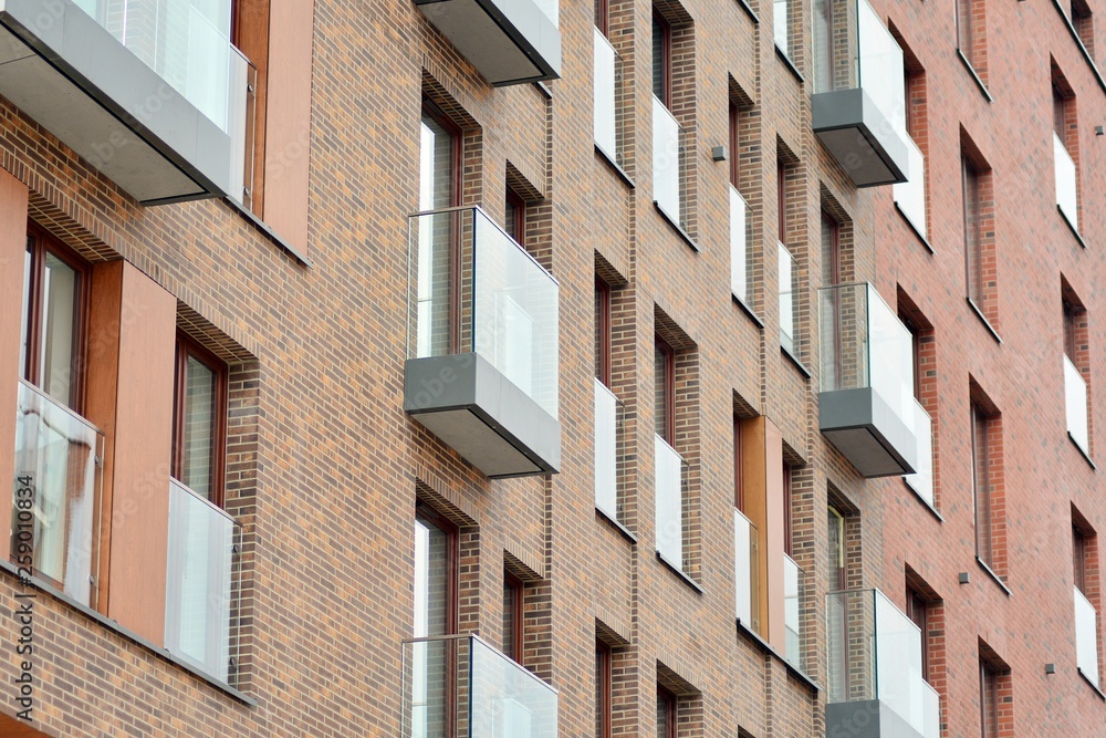 Fragment of a modern apartment building in front. Very modern apartment house.