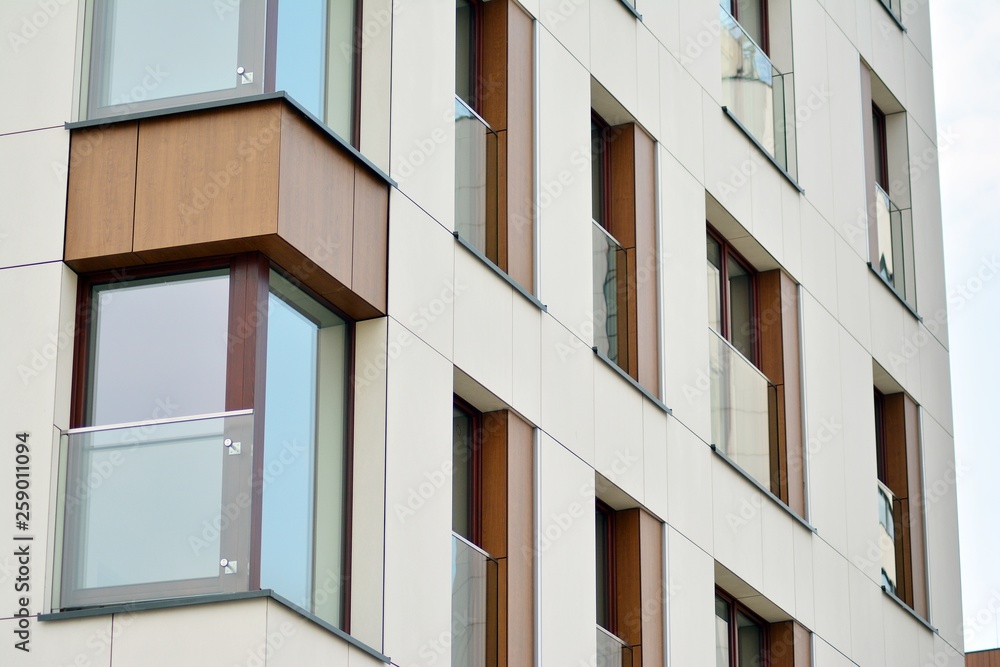 Fragment of a modern apartment building in front. Very modern apartment house.