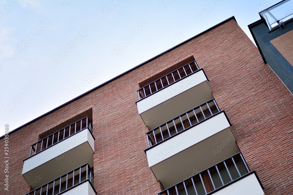 Fragment of a modern apartment building in front. Very modern apartment house.