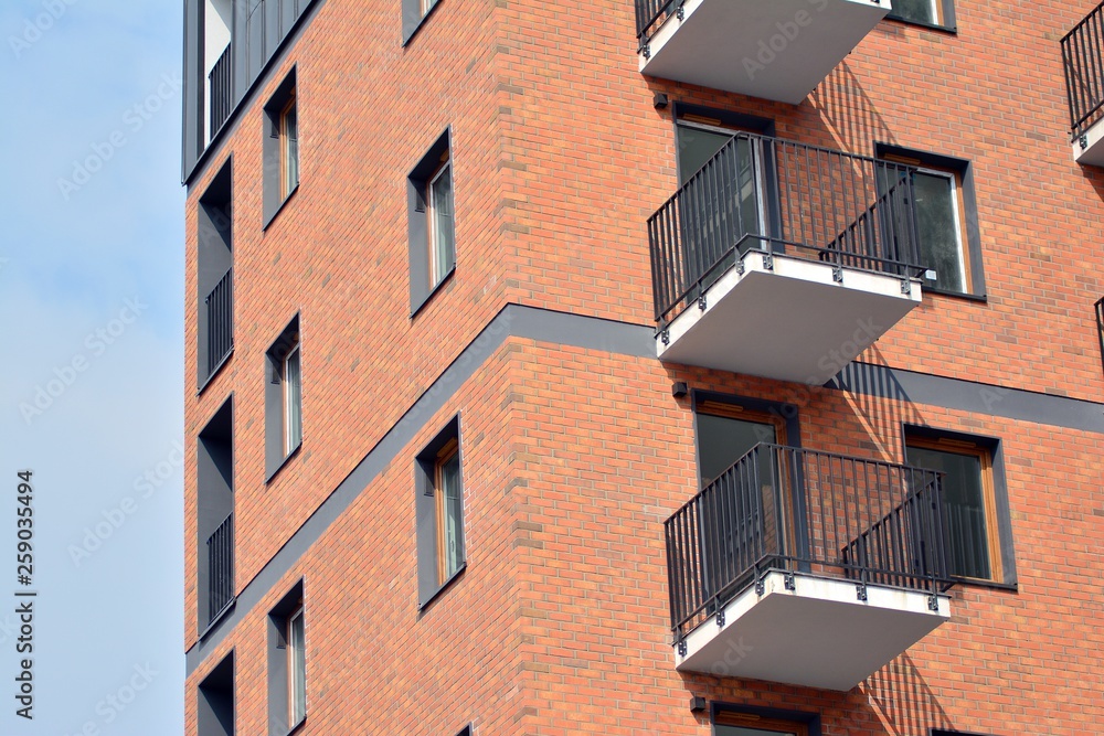 Fragment of a modern apartment building in front. Very modern apartment house.