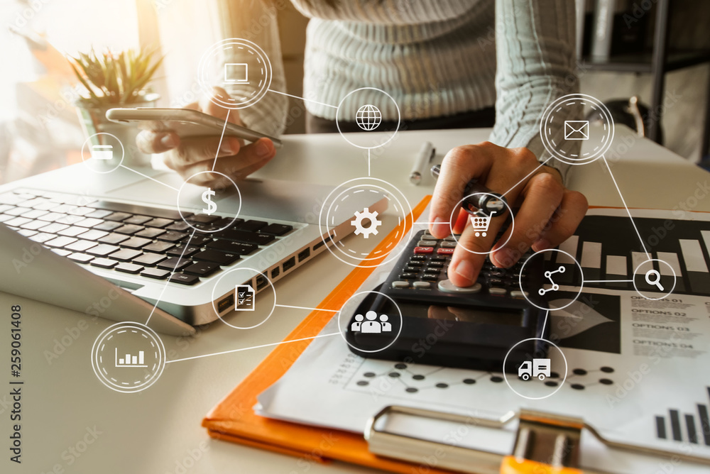 business woman hand working with laptop computer, tablet and smart phone in office with digital mark