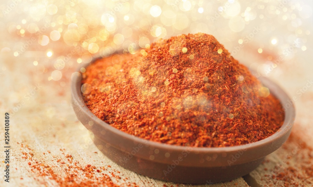 Aprika powder in wooden bowl