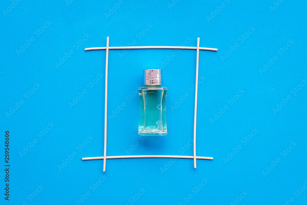 fragrance diffuser for air freshness on blue background top view mock-up