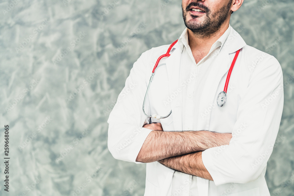 Young male doctor working at the hospital. Medical healthcare and doctor staff service.