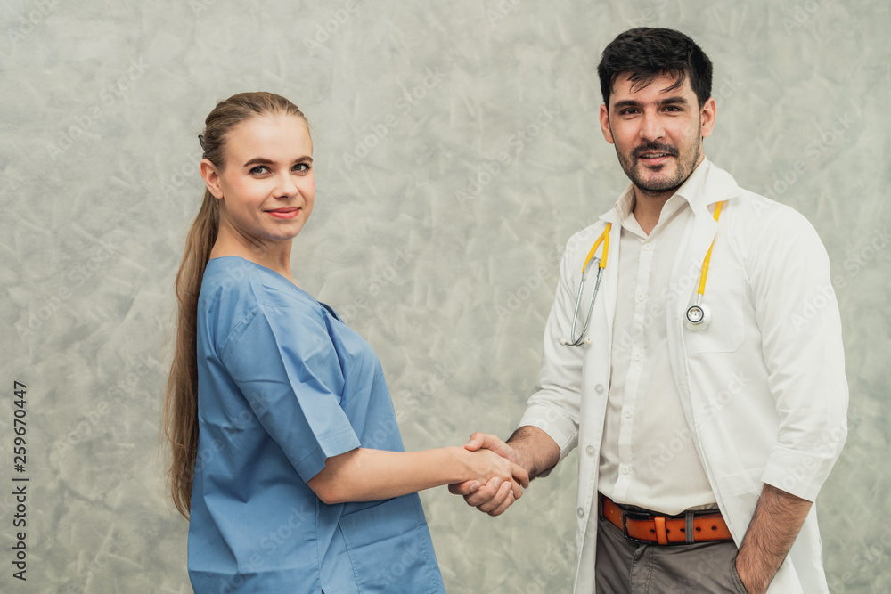 Doctor and nurse working in hospital. Healthcare and medical staff service concept.