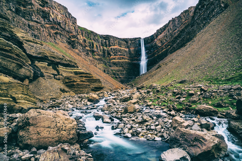 Beautiful Hengifoss Waterfall in Eastern Iceland. Nature travel landscape.