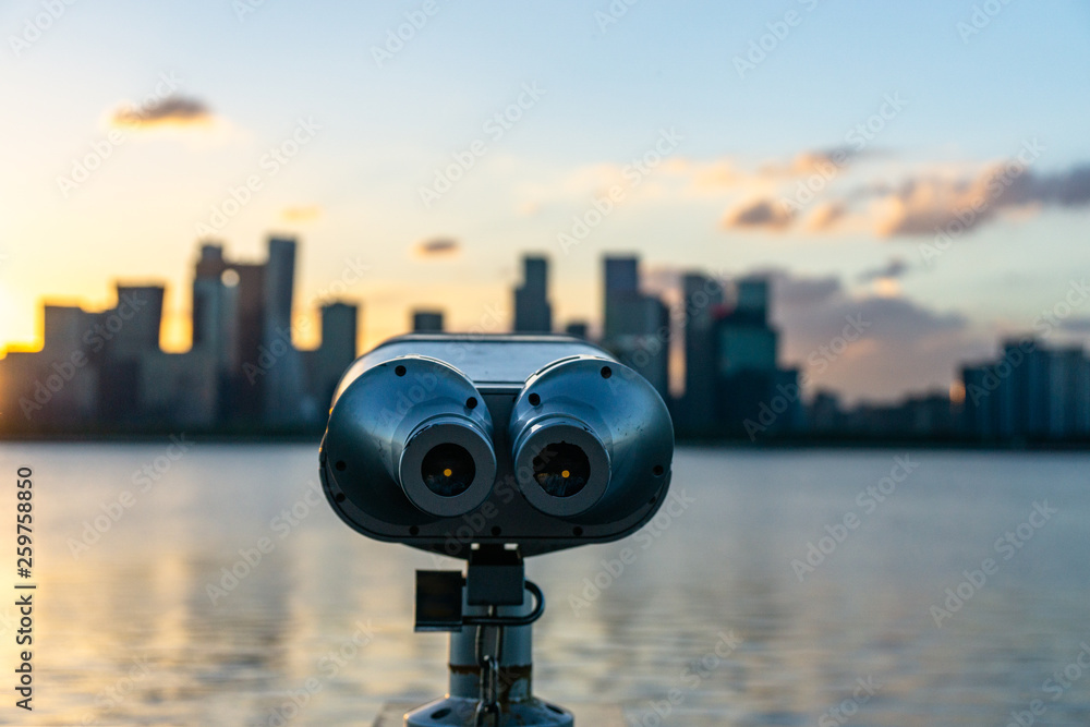 binoculars on background of blue sky