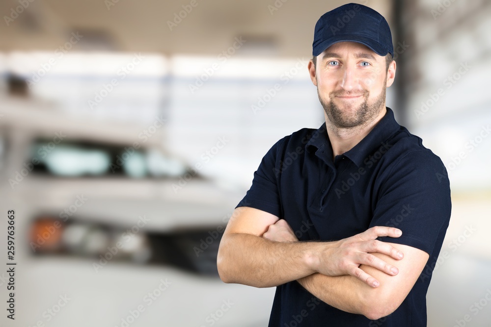 Auto Repair Shop, Male Mechanic near Car