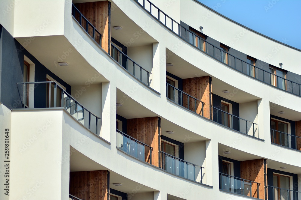 European modern residential architecture. Fragment of a modern apartment building in front. Very mod