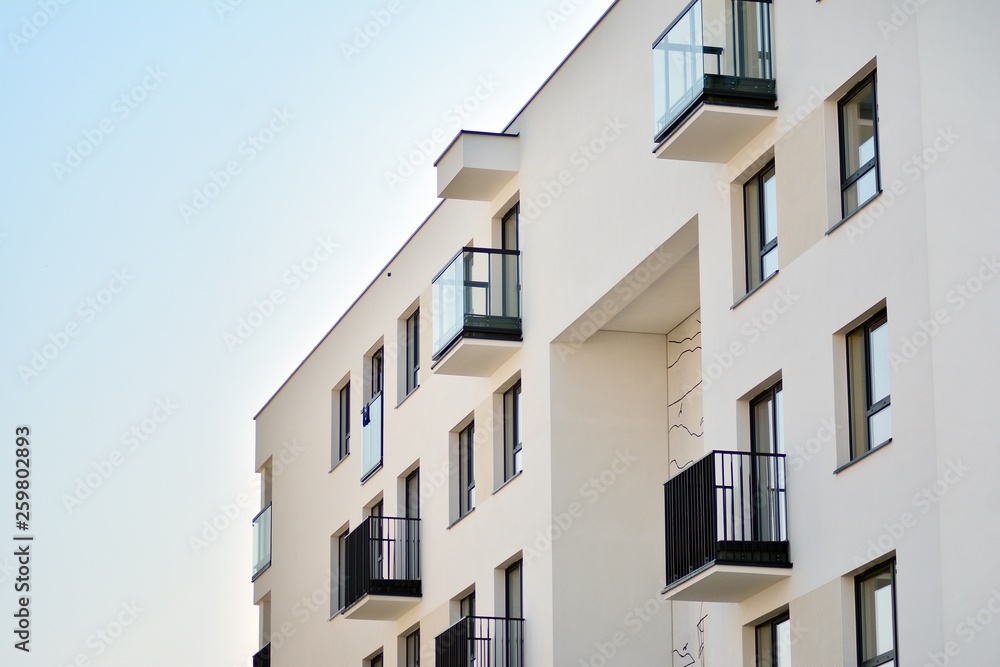 European modern residential architecture. Fragment of a modern apartment building in front. Very mod