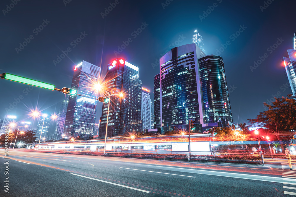 Urban Nightscape Architecture Street and Fuzzy Car Lights..