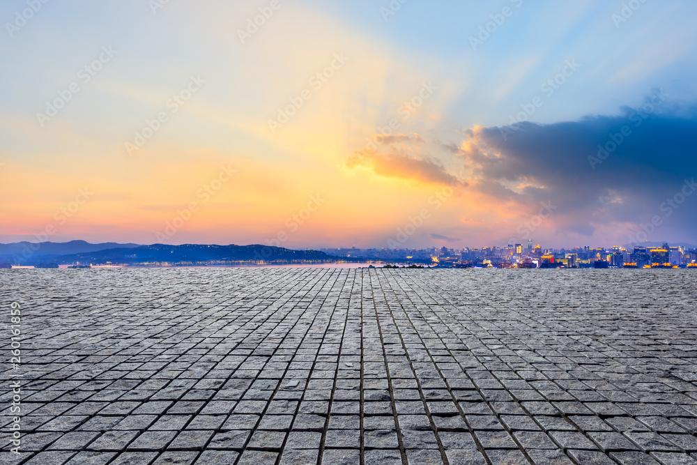 Empty square floor and beautiful city scenery with mountain in Hangzhou