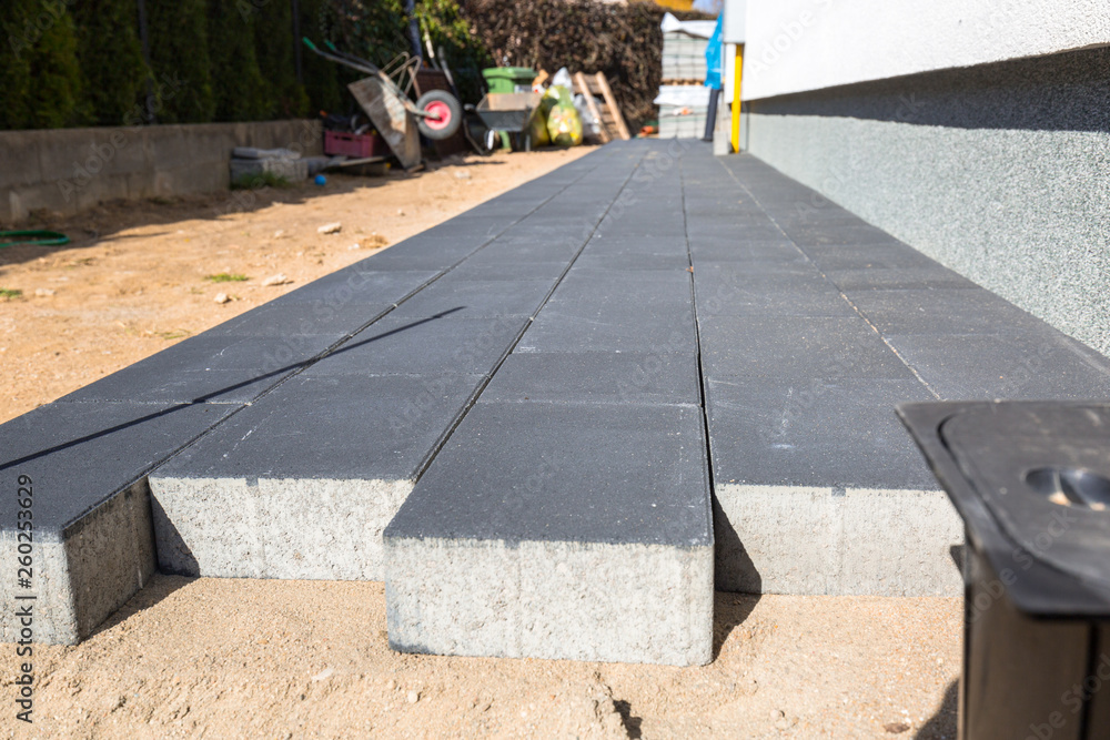 Concrete paver blocks laid near the house