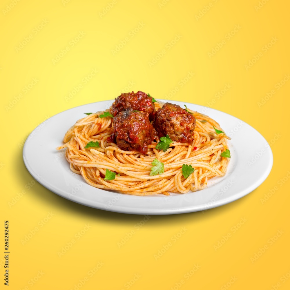 pasta with meatballs and parsley with tomato sauce