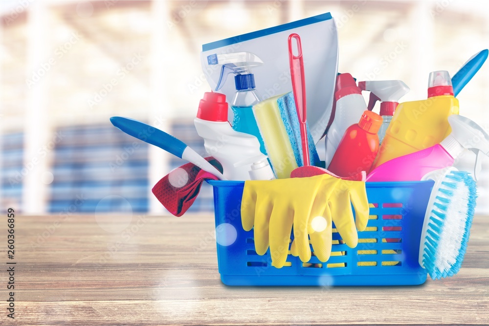 Plastic bottles, cleaning sponges and gloves  on background