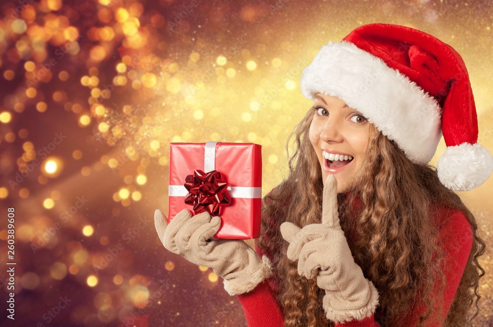 Young woman with shopping bags on  background