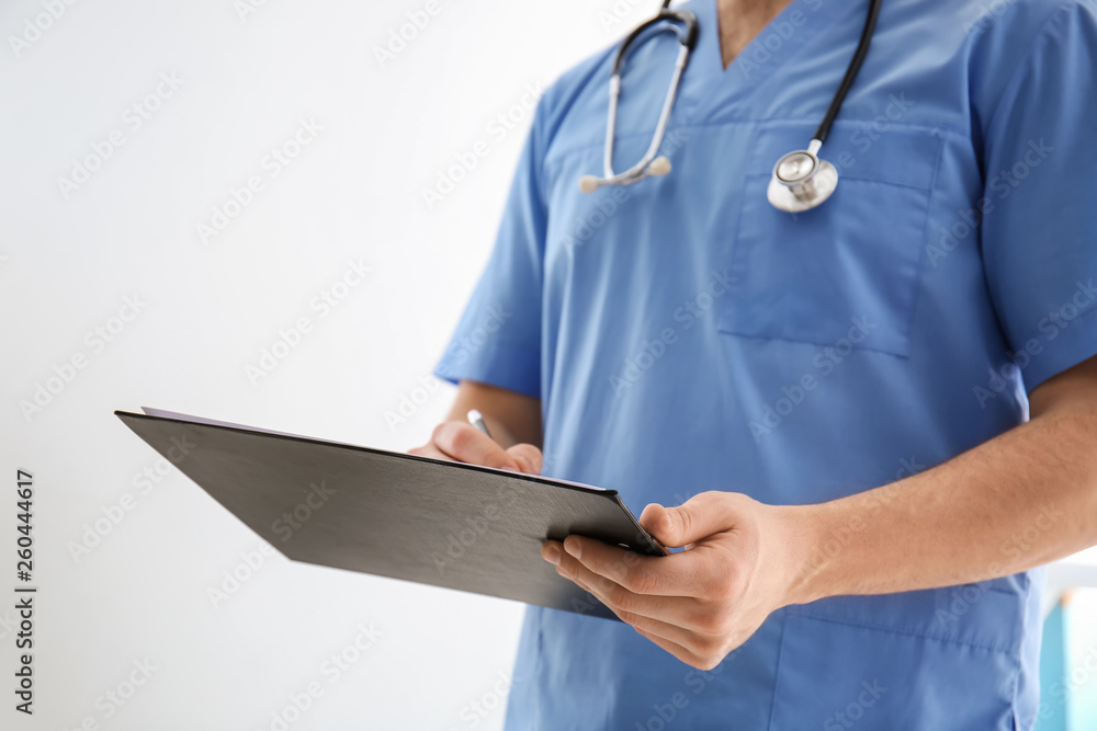 Male doctor working in clinic