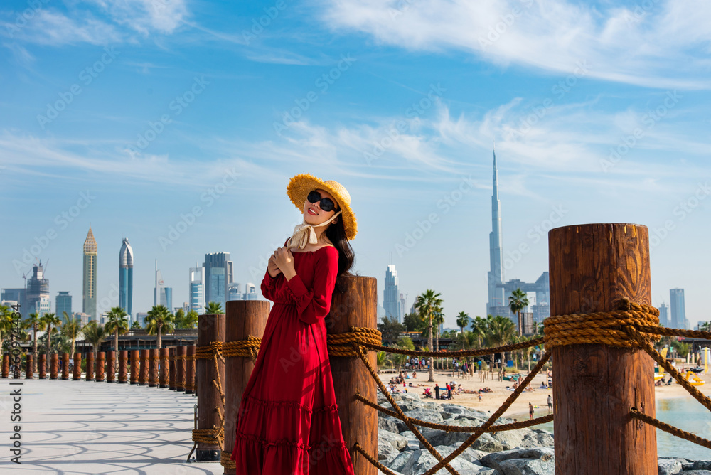 Woman with panoramic view of Dubai downtown