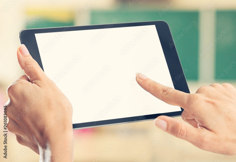 Human hands Holding digital tablet with blank screen isolated on white