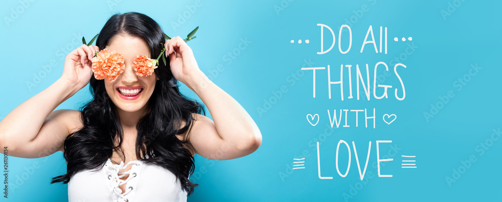 Do all things with love message with young woman holding carnation flowers