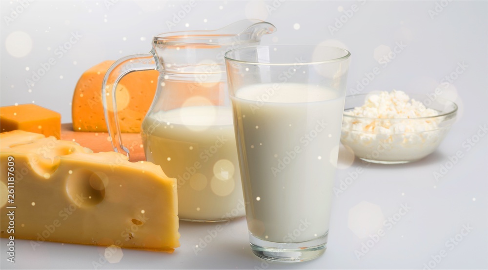 Dairy Products- Cheeses and Milk on the Grey Background