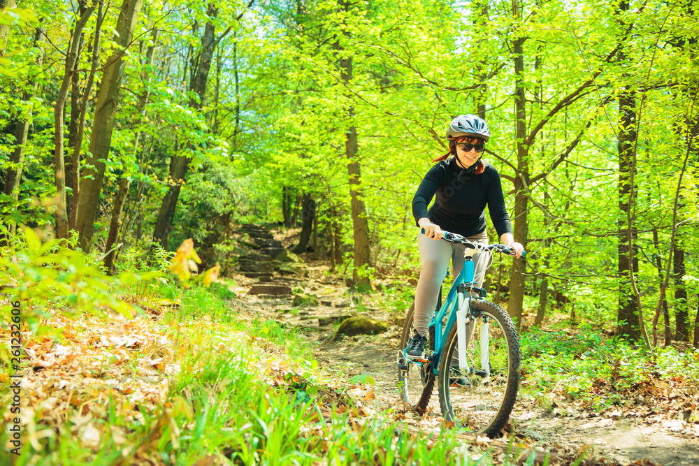 Young Woman Riding Her Mountain Bike