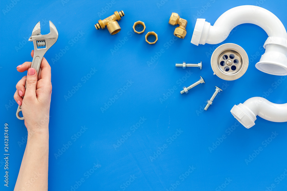 Plumber work with instruments, tools and gear on blue background top view mock up