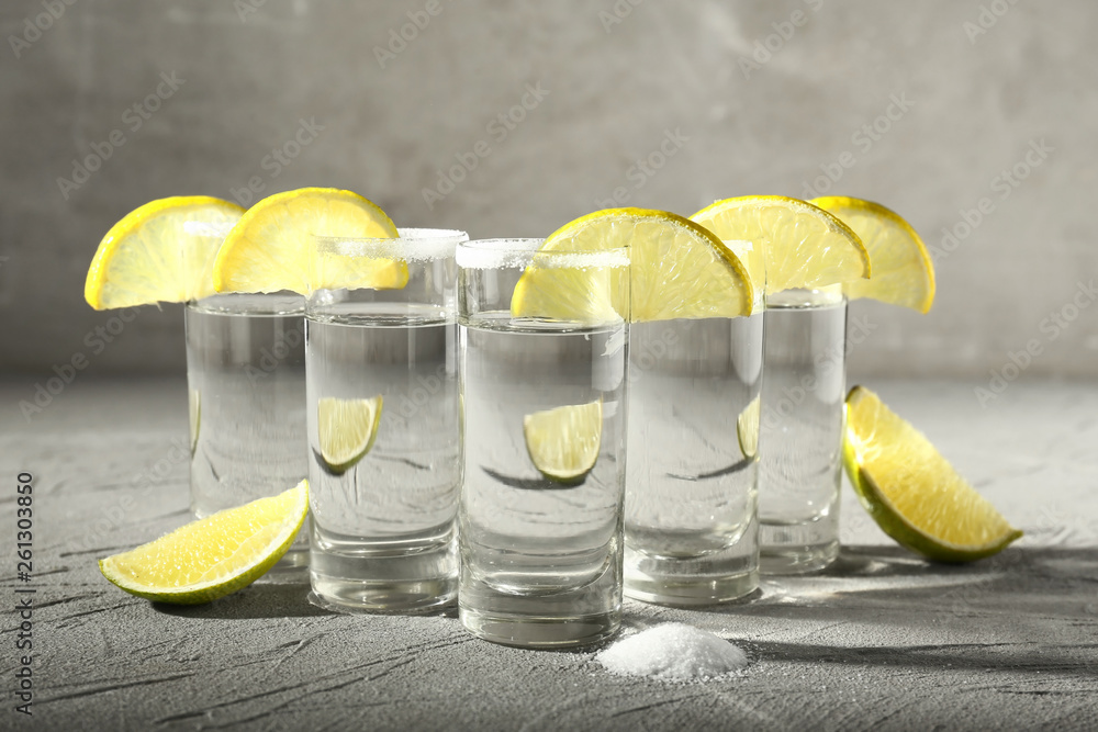 Shots of tequila on light table