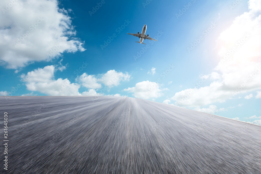 Motion blurred asphalt road ground and sky clouds scene