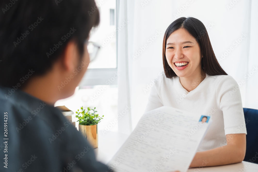 Asian business woman discussing/job interview with colleauge/boss for business meeting