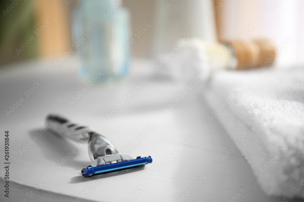 Razor on white table