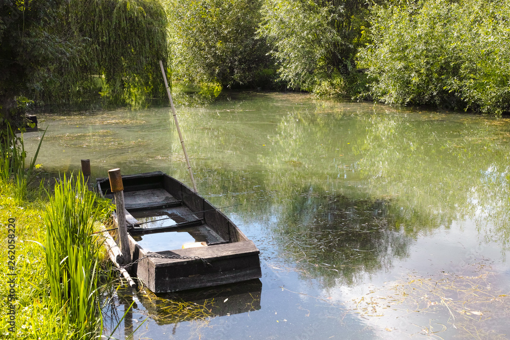 Small boat in marshes in Bourges