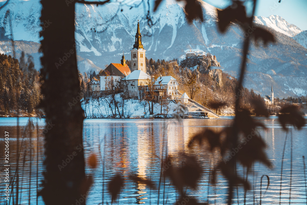 Lake Bled with Bled Island and Castle at sunrise in winter, Slovenia