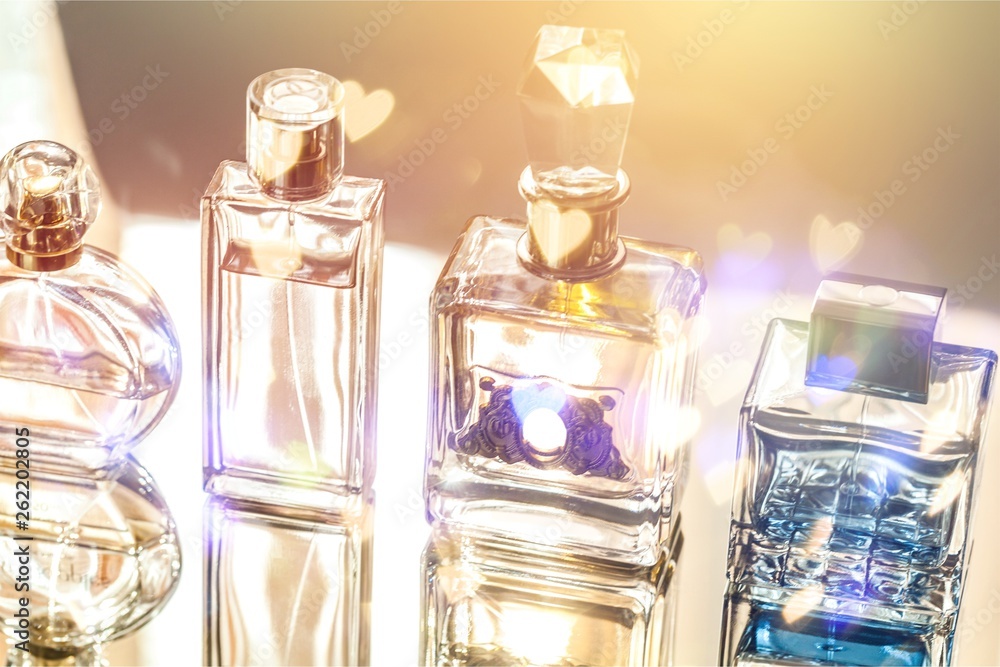 Aromatic Perfume bottles on background