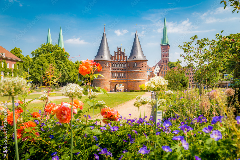 Historic town of Lübeck with famous Holstentor gate in summer, Schleswig-Holstein, northern Germany