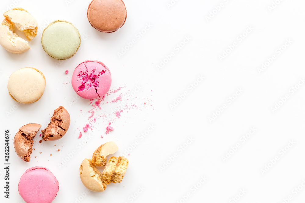 Macarons design on white background top view space for text