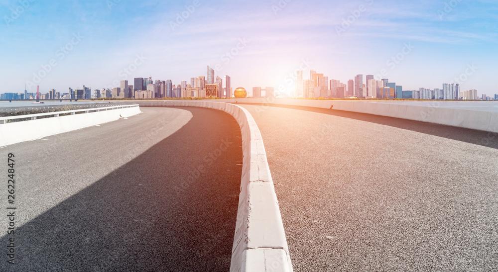 Road and skyline of urban architecture