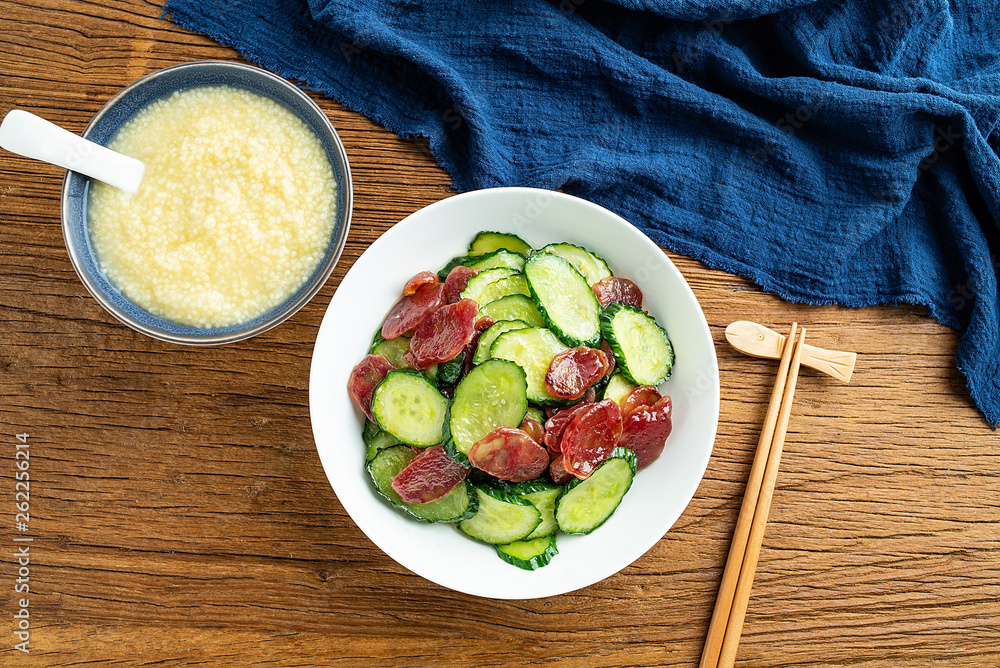 Cucumber fried sausage and millet porridge